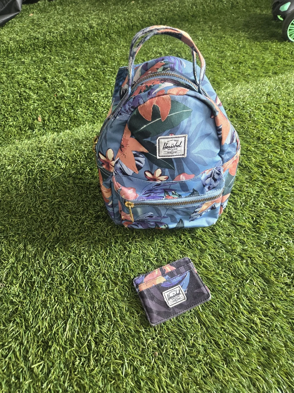 Herschel Supply Company Kids Floral Mini Backpack in Blue with Orange Accents